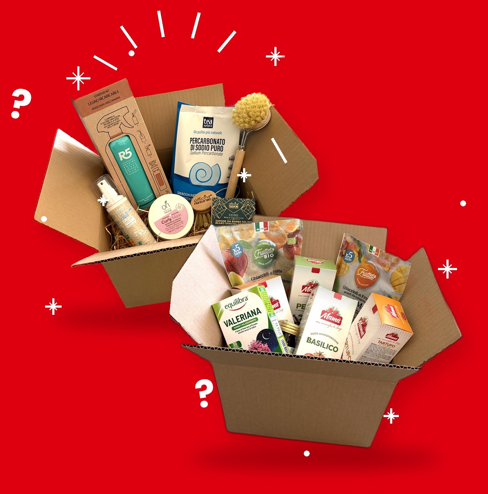 Mystery Box WHATaECO aperte, piene di prodotti 100% vegetali, su fondo rosso